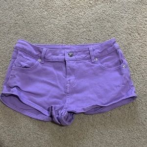 Purple short shorts.